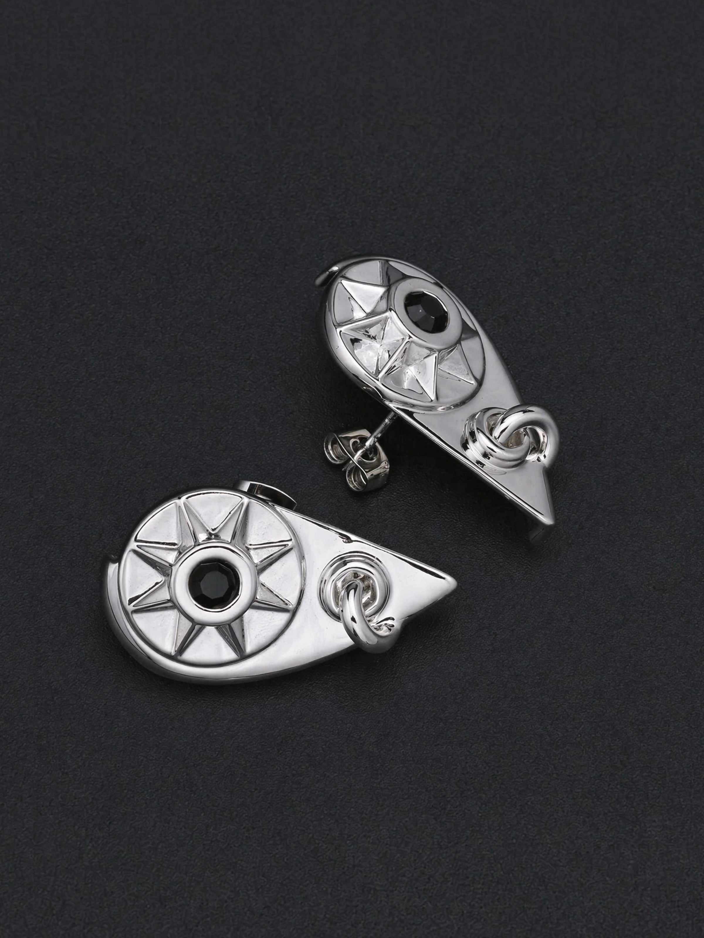 FRACTURED COMPASS STUDS